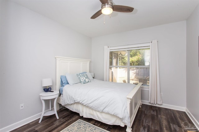 bedroom featuring dark hardwood / wood-style flooring and ceiling fan