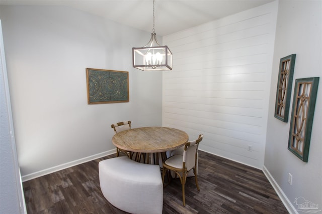 dining space featuring dark hardwood / wood-style floors