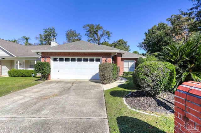 single story home with a garage and a front lawn