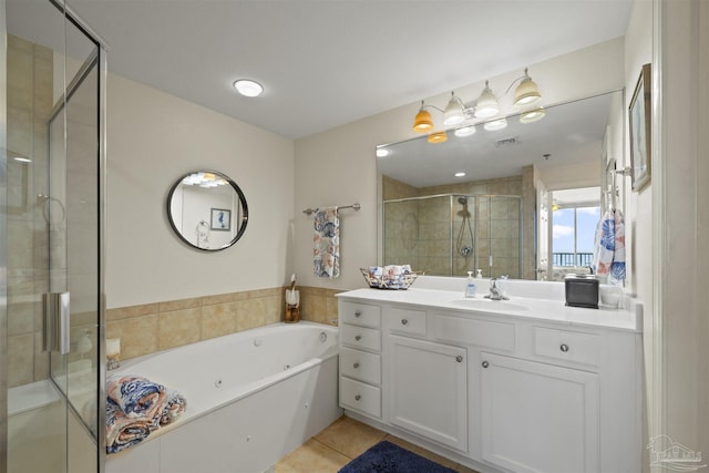 bathroom with a whirlpool tub, visible vents, a shower stall, tile patterned flooring, and vanity