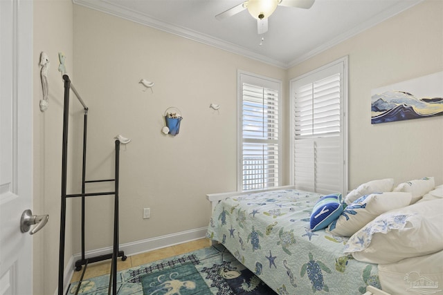 tiled bedroom featuring crown molding, baseboards, and ceiling fan
