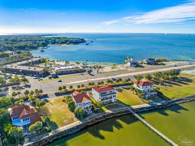 aerial view at dusk with a water view