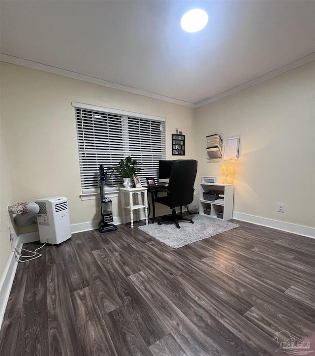 office space with wood finished floors, crown molding, and baseboards