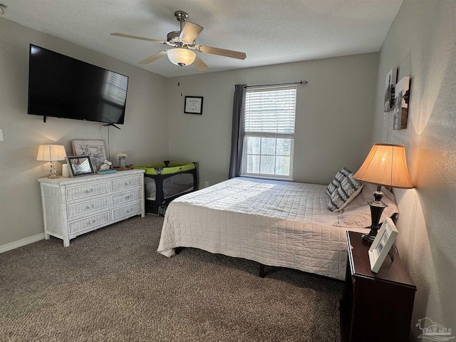 bedroom featuring dark carpet and ceiling fan
