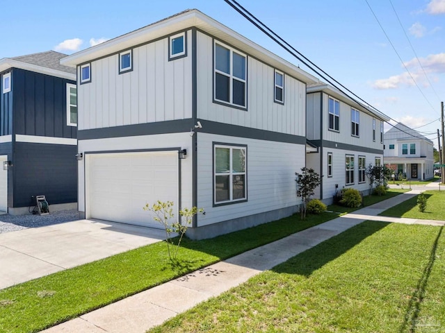 view of side of property with a garage and a lawn