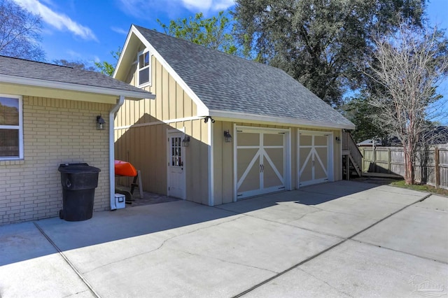 detached garage with fence