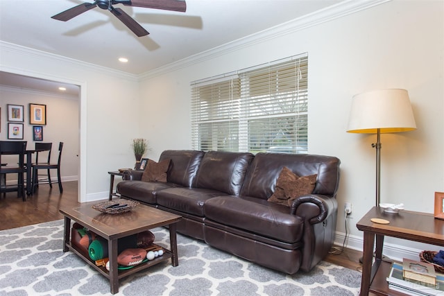 living room with crown molding, baseboards, ceiling fan, recessed lighting, and wood finished floors