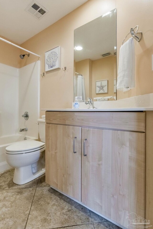 521 W Beach Blvd Unit 702, Gulf Shores, AL 36542 - bathroom featuring visible vents, toilet, shower / tub combination, tile patterned floors, and vanity