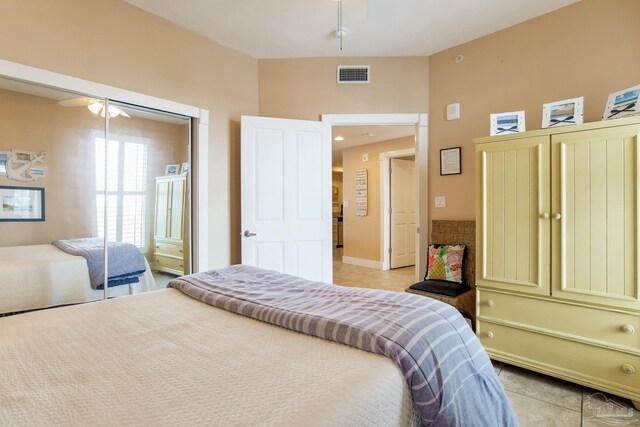 521 W Beach Blvd Unit 702, Gulf Shores, AL 36542 - bedroom featuring ceiling fan, visible vents, and light tile patterned flooring