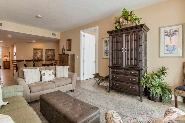 521 W Beach Blvd Unit 702, Gulf Shores, AL 36542 - living area with light tile patterned floors, visible vents, and recessed lighting