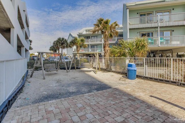 521 W Beach Blvd Unit 702, Gulf Shores, AL 36542 - exterior space with fence