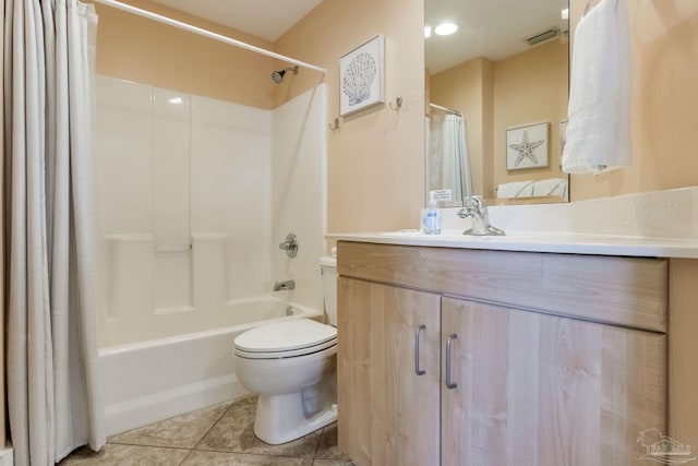 521 W Beach Blvd Unit 702, Gulf Shores, AL 36542 - bathroom with toilet, visible vents, vanity, tile patterned floors, and shower / bath combo with shower curtain