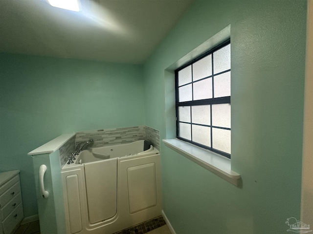 bathroom featuring a bathing tub