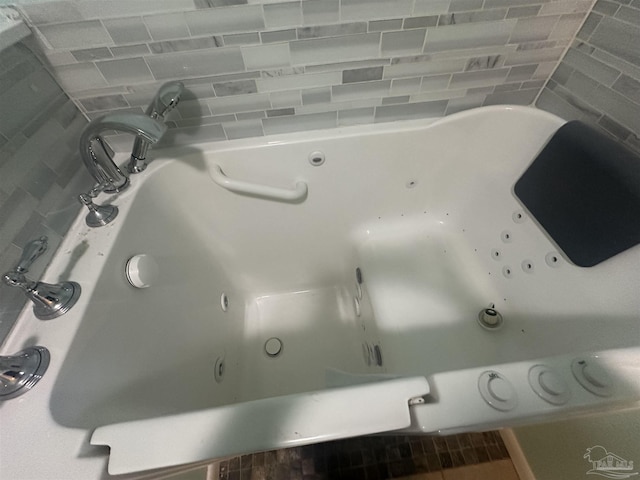 room details with sink and a tub to relax in