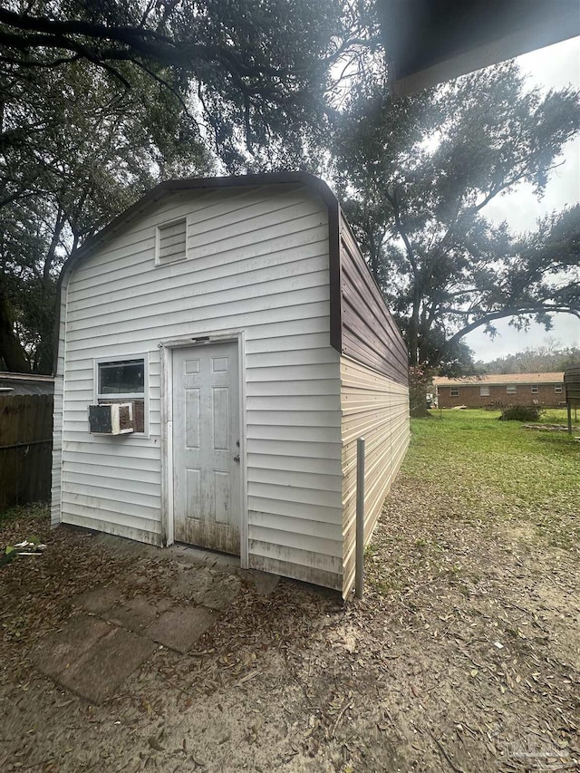 view of outbuilding with cooling unit