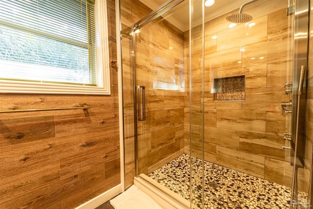 bathroom with a shower stall