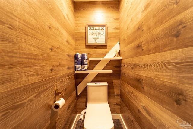 details with wood walls and toilet