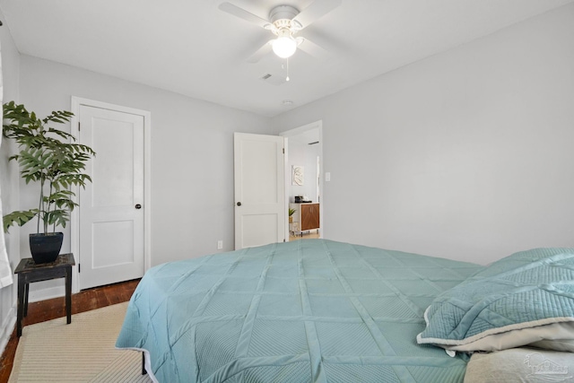 bedroom with ceiling fan and hardwood / wood-style floors