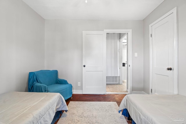 bedroom featuring hardwood / wood-style floors