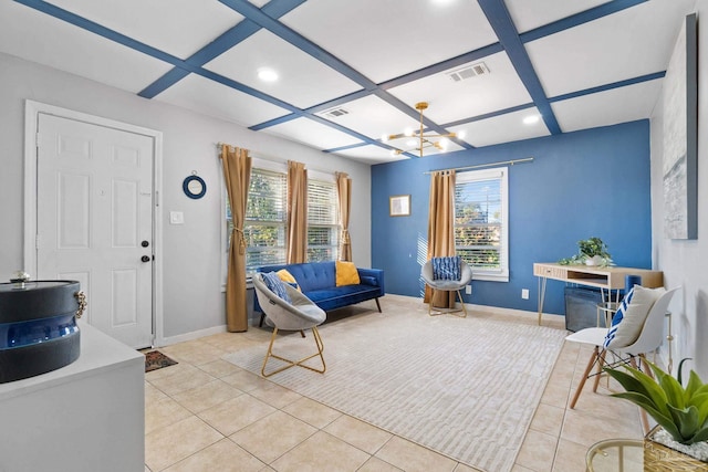 interior space featuring a wealth of natural light, coffered ceiling, and light tile patterned flooring