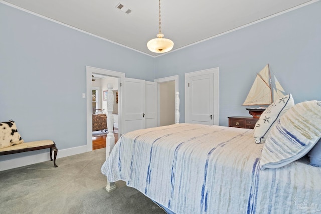 1703 E Avery St, Pensacola, FL 32503 - carpeted bedroom featuring crown molding and baseboards