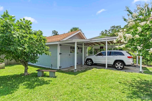 1703 E Avery St, Pensacola, FL 32503 - view of outbuilding with a carport