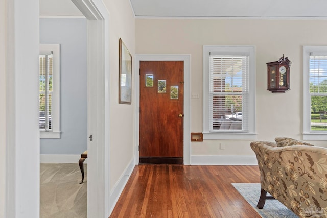 1703 E Avery St, Pensacola, FL 32503 - foyer featuring dark wood-style floors and ornamental molding