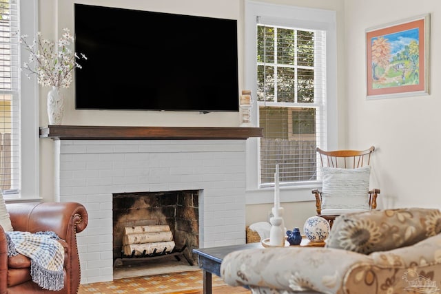 1703 E Avery St, Pensacola, FL 32503 - living area featuring a brick fireplace