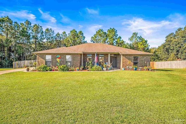 ranch-style home with a front yard