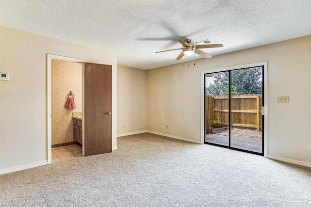 unfurnished bedroom with light carpet, a textured ceiling, ceiling fan, and access to exterior