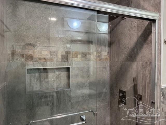 bathroom featuring a stall shower