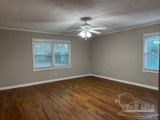 unfurnished room with baseboards, a ceiling fan, ornamental molding, wood finished floors, and a textured ceiling