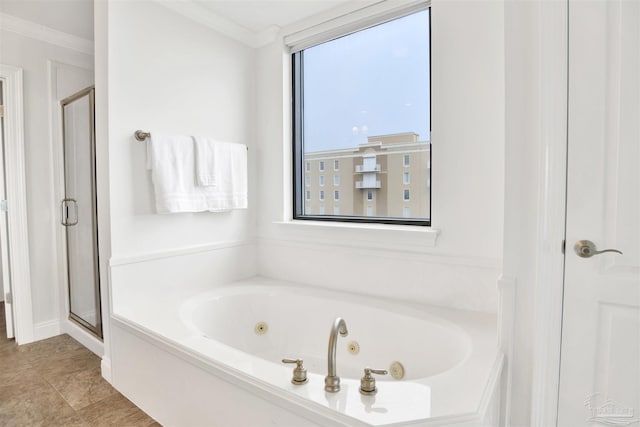 17075 Perdido Key Dr Unit 4E, Pensacola, FL 32507 - full bathroom with crown molding, a jetted tub, and a stall shower