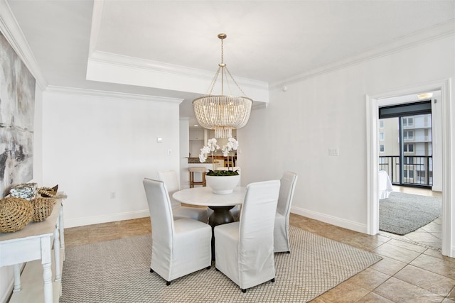 17075 Perdido Key Dr Unit 4E, Pensacola, FL 32507 - dining space with a chandelier, ornamental molding, and baseboards