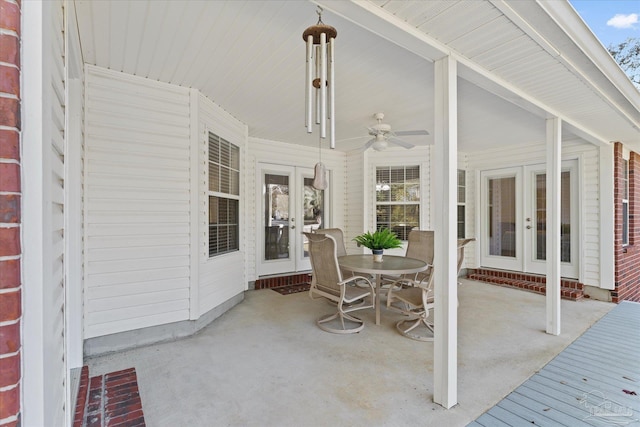 view of patio featuring ceiling fan and french doors