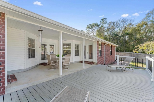 wooden terrace featuring french doors