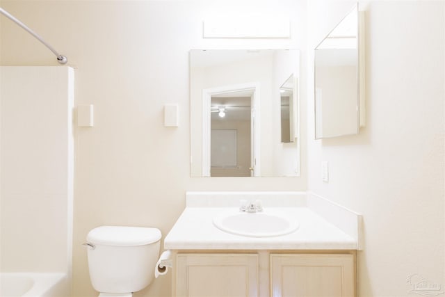 full bathroom featuring vanity, toilet, and shower / bathtub combination