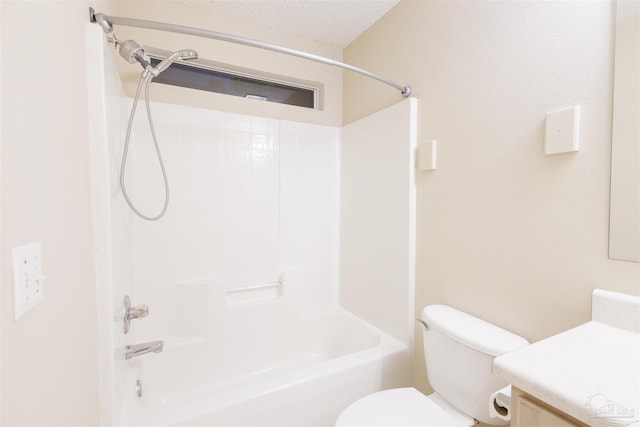 full bathroom with toilet, bathtub / shower combination, vanity, and a textured ceiling