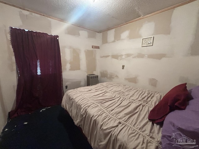 bedroom with a textured ceiling