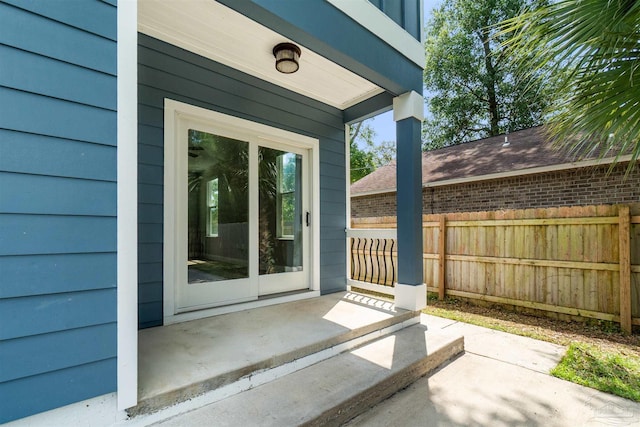 277 Seamarge Ln, Pensacola, FL 32507 - view of exterior entry with a patio