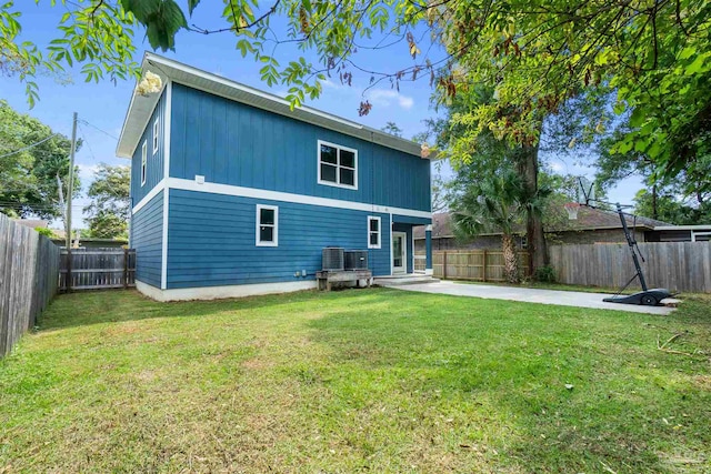 277 Seamarge Ln, Pensacola, FL 32507 - back of house with a patio area and central AC