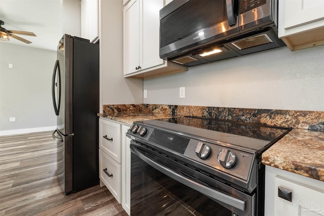 277 Seamarge Ln, Pensacola, FL 32507 - kitchen with appliances with stainless steel finishes, white cabinetry, ceiling fan, and wood finished floors