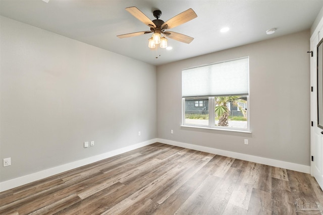 277 Seamarge Ln, Pensacola, FL 32507 - empty room with baseboards, recessed lighting, wood finished floors, ceiling fan, and a smoke detector