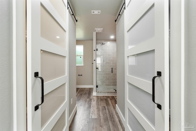 277 Seamarge Ln, Pensacola, FL 32507 - full bath with a stall shower, wood finished floors, and baseboards
