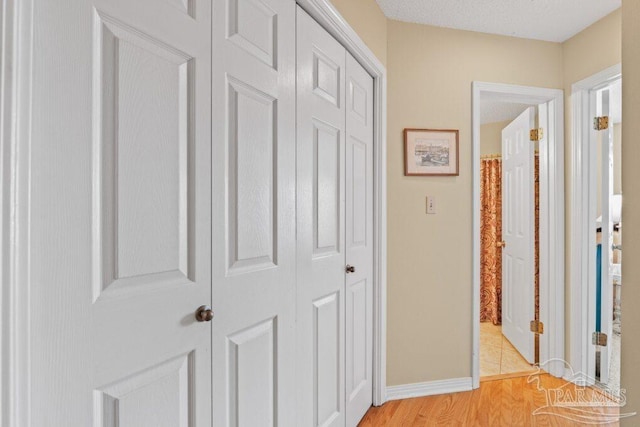 hall featuring light hardwood / wood-style floors