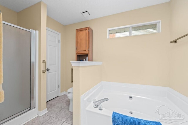 bathroom featuring toilet, independent shower and bath, and tile patterned flooring