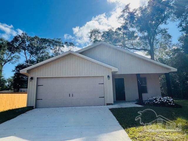 single story home featuring a garage