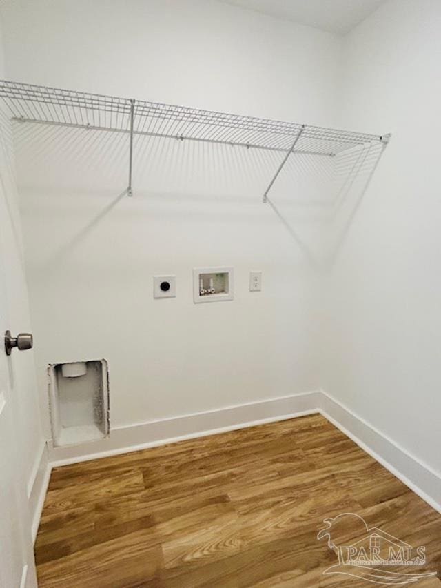 laundry room with hookup for an electric dryer, wood-type flooring, and hookup for a washing machine