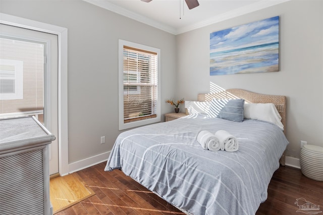 bedroom featuring ornamental molding, ceiling fan, and dark hardwood / wood-style flooring