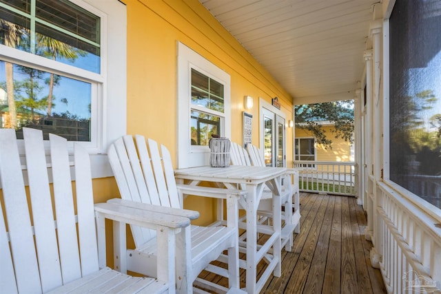 wooden deck featuring covered porch